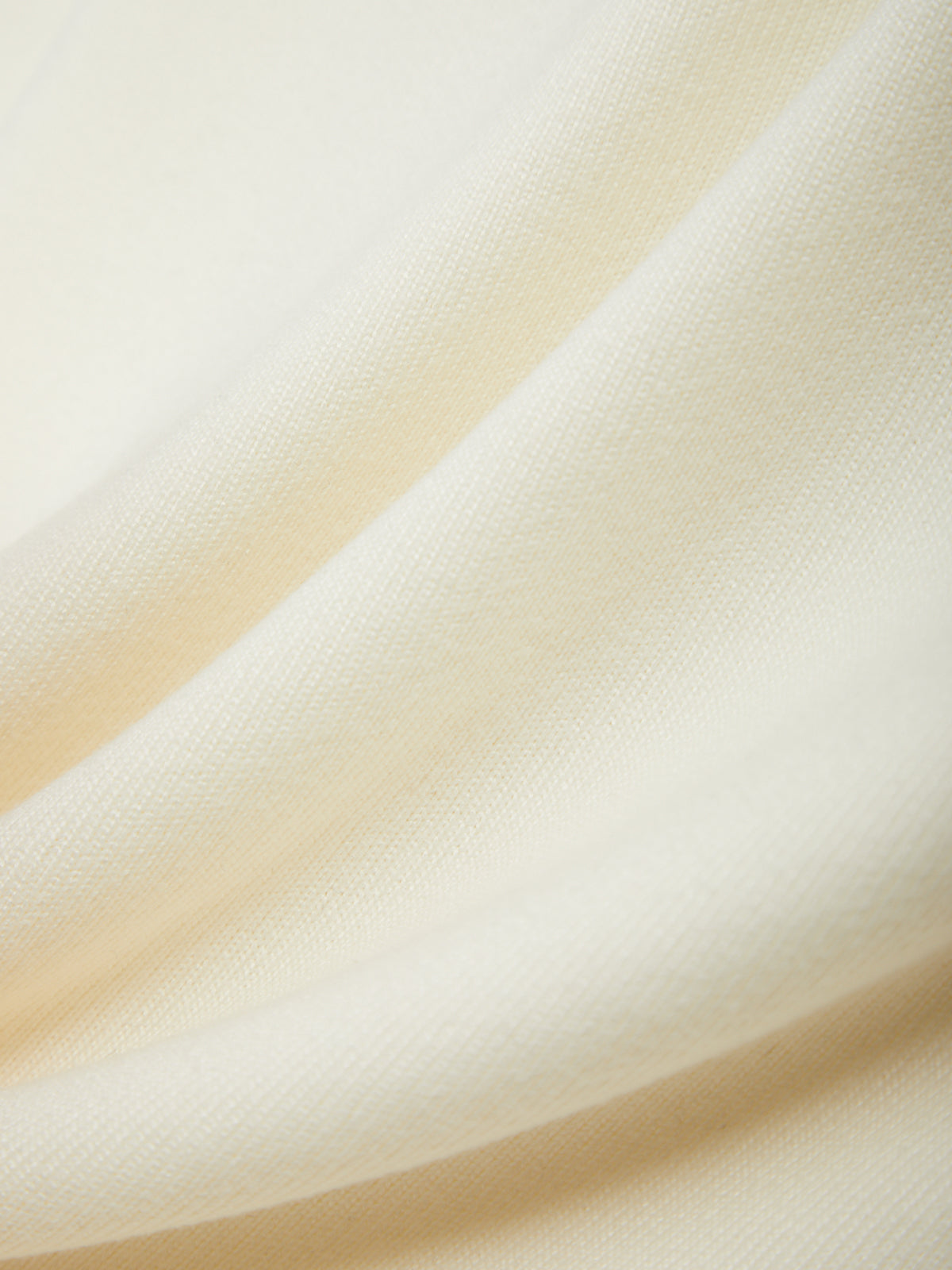 Close-up of beige fabric with soft texture