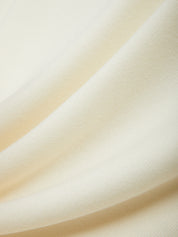 Close-up of beige fabric with soft texture