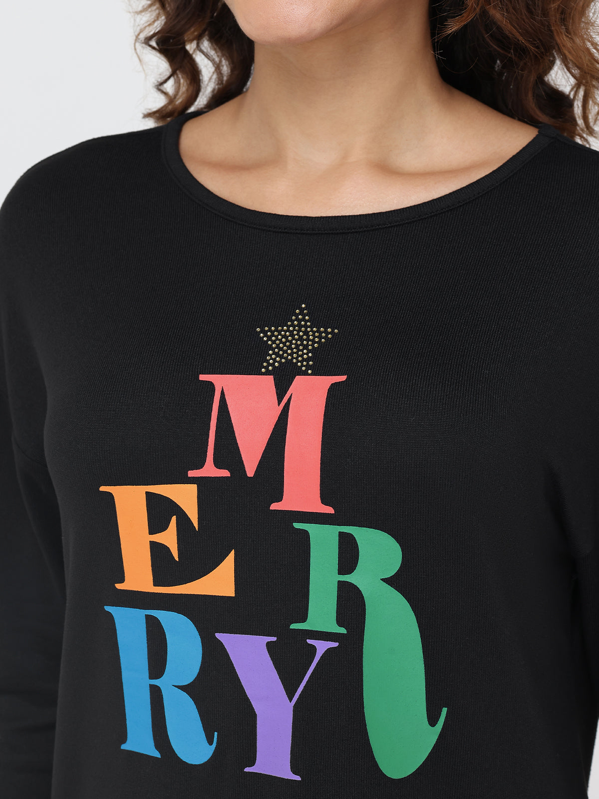 Black top with colorful 'MERRY' text and star design.