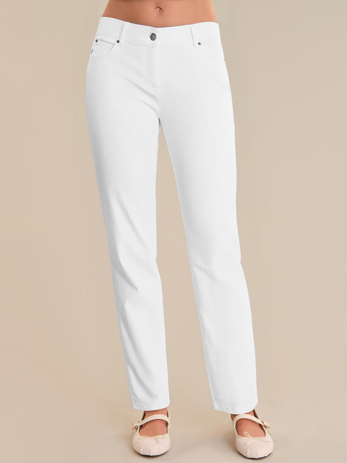White pants on a beige background