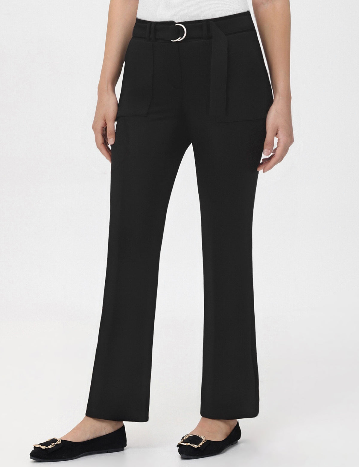 Black pants worn by a person on a white background