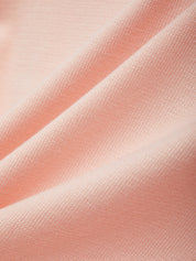 Close-up of pink fabric with folds