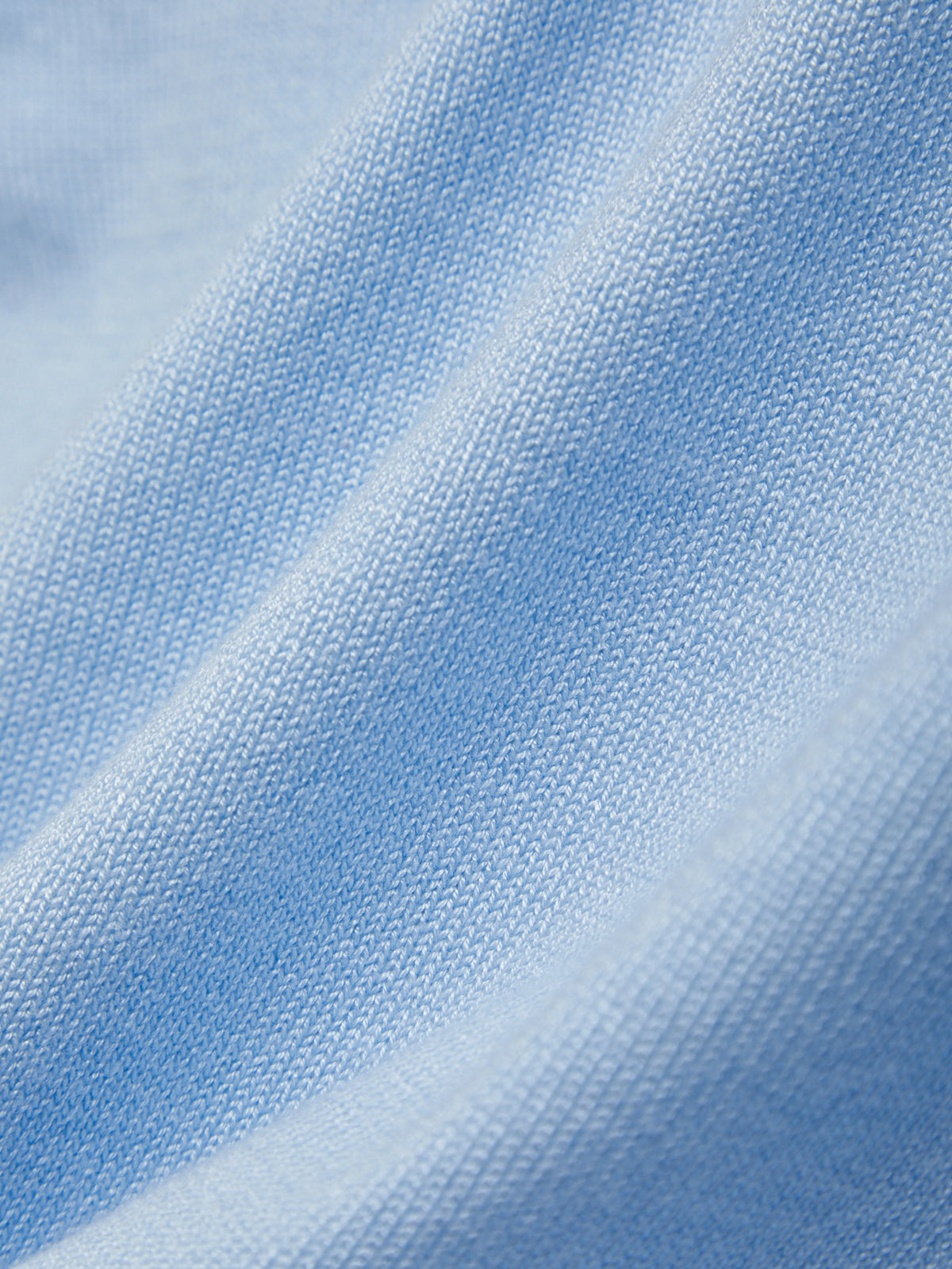 Close-up of light blue fabric texture