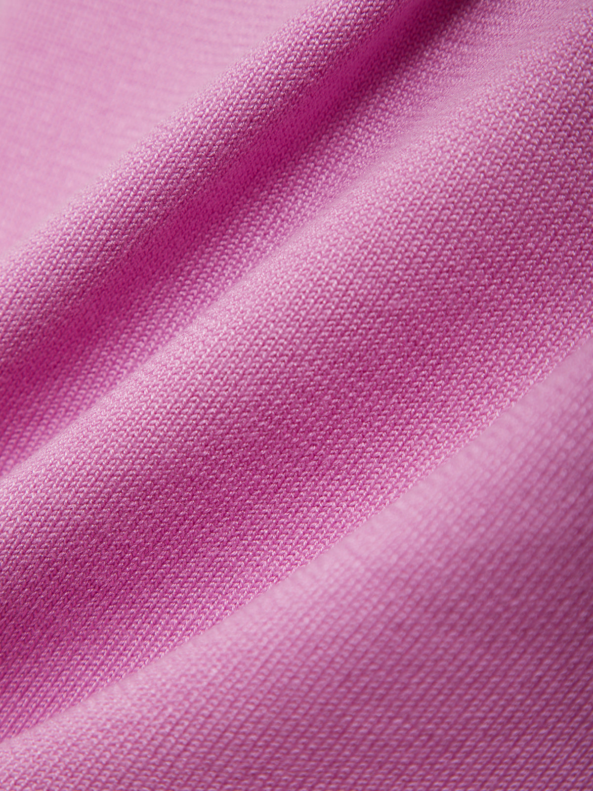 Close-up of pink fabric with visible texture