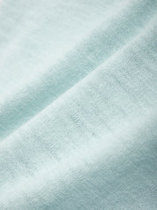Close-up of light blue fabric texture