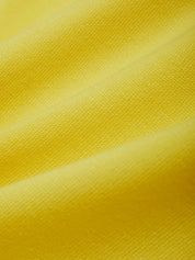 Close-up of yellow fabric texture