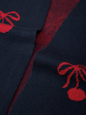 Navy blue fabric with red floral patterns