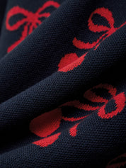 Navy fabric with red floral patterns