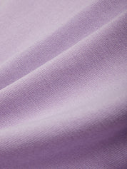 Close-up of purple fabric with visible texture