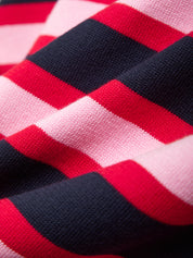 Close-up of red, pink, and navy striped fabric