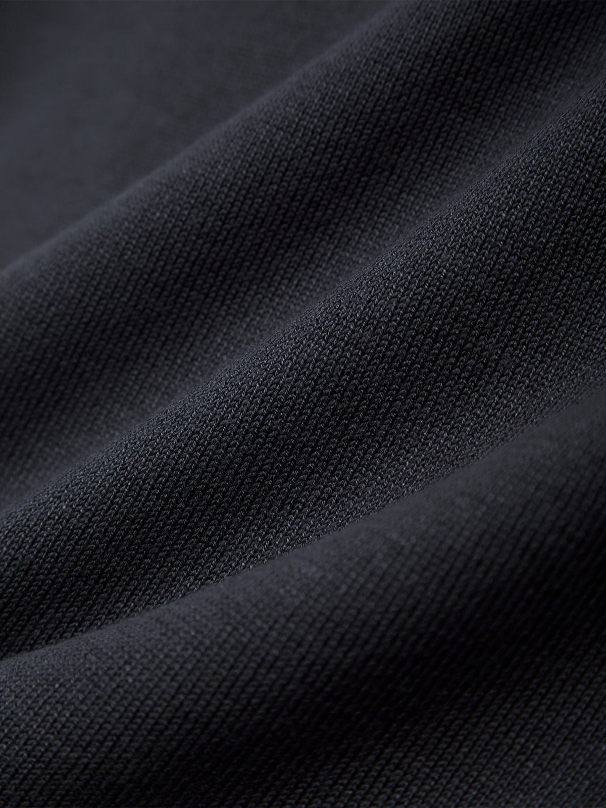 Close-up of dark blue fabric texture
