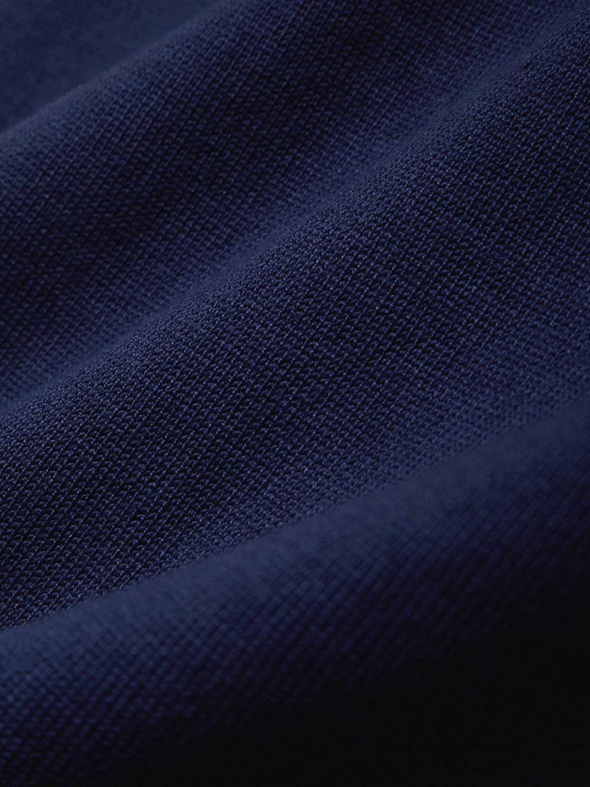 Close-up of dark blue fabric texture