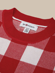Red and white checkered sweater with '89th Madison' label on a beige background