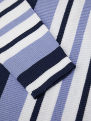 Close-up of a blue and white striped fabric with a focus on the pattern.