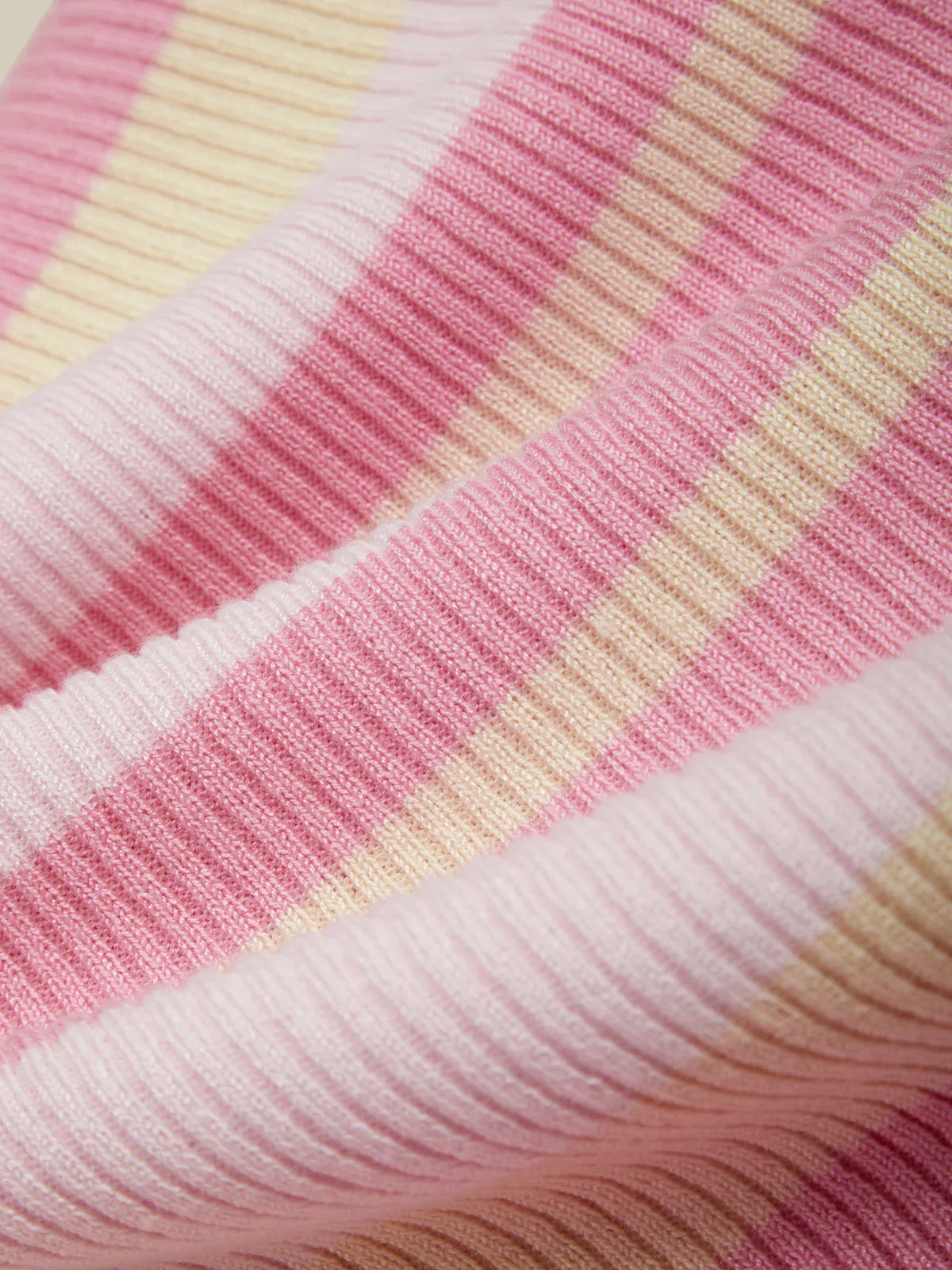 Close-up of pink and yellow striped fabric