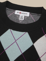 Close-up of a knit sweater with a black ribbed crew neck and an argyle pattern featuring light blue, white, and purple diamonds. The brand label '89th & MADISON' is visible inside the collar.