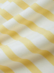 Close-up of yellow and white striped fabric