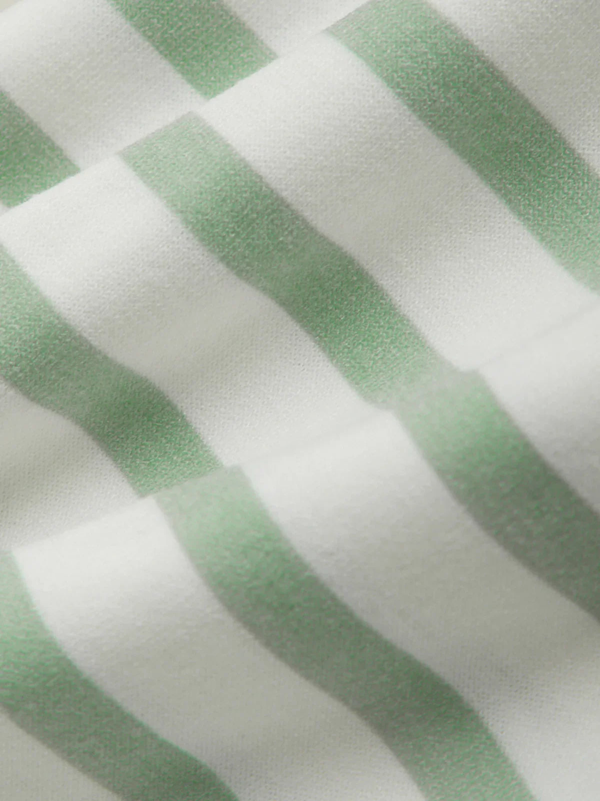 Close-up of green and white striped fabric