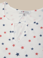 Baby onesie with star pattern on a plain background