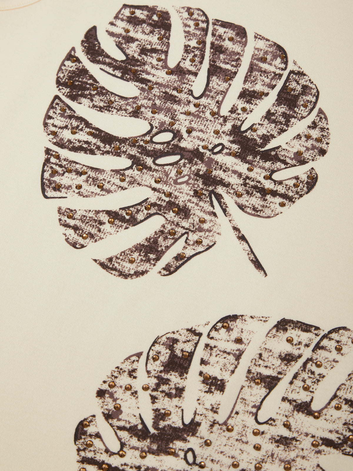 Brown leaf pattern on a beige background