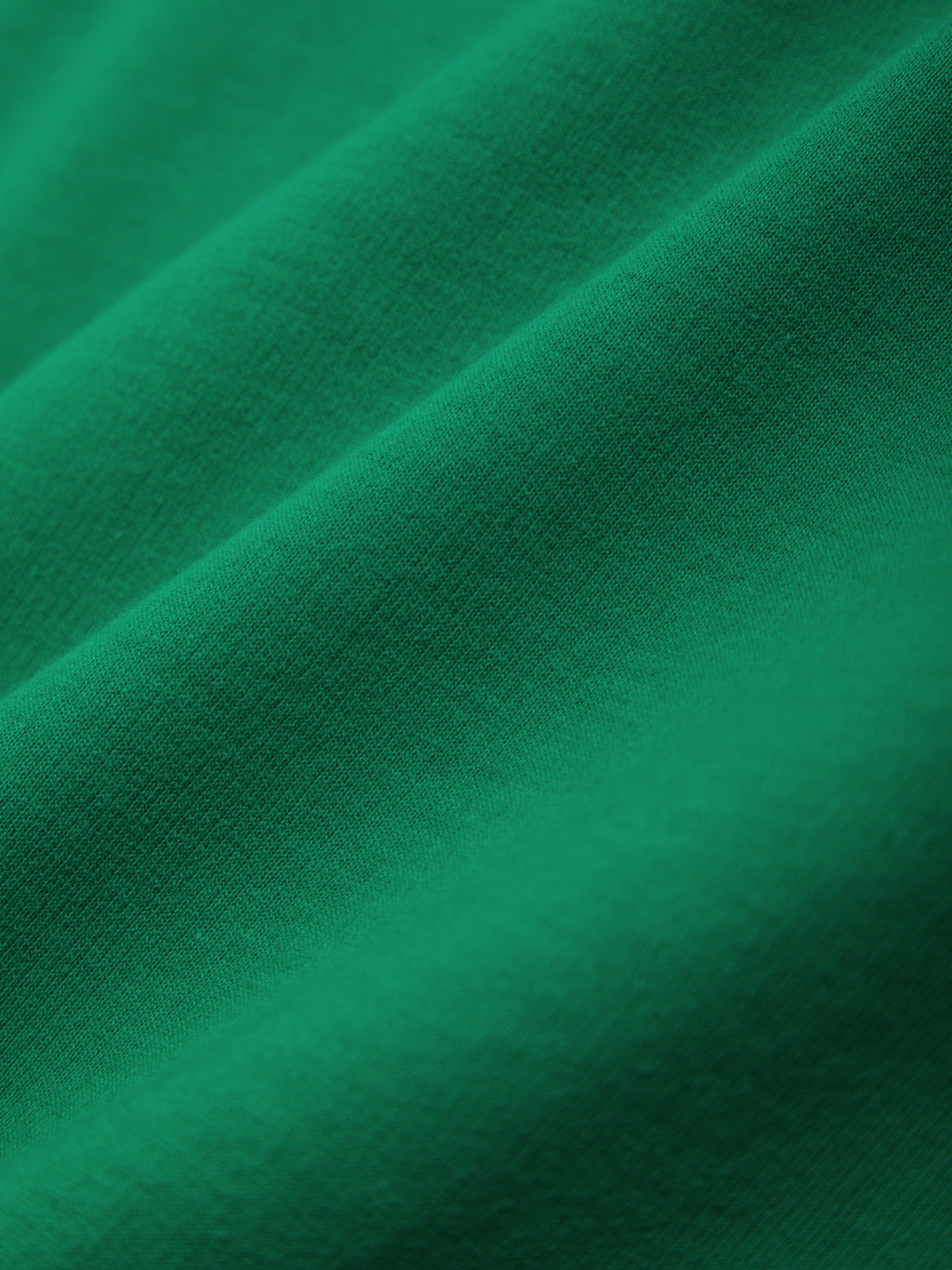 Close-up of green fabric with visible texture