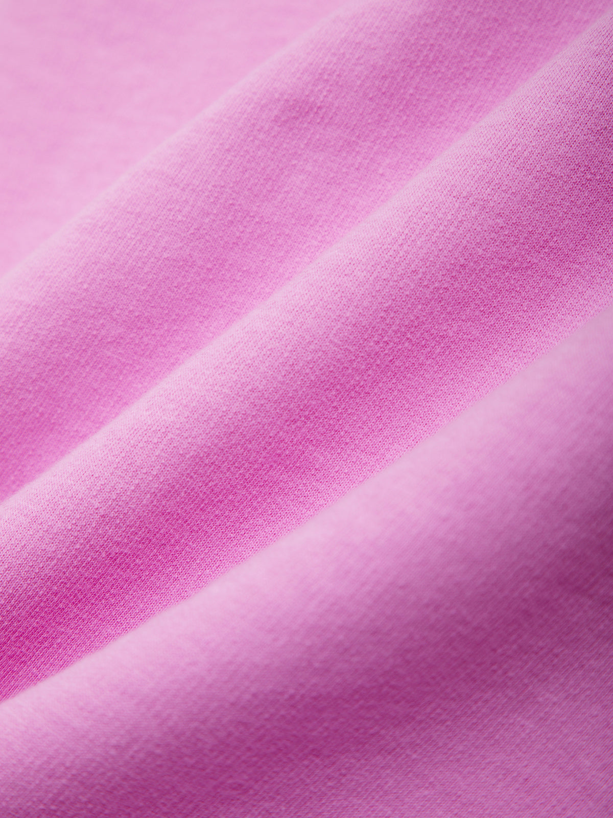 Close-up of pink fabric with a soft texture