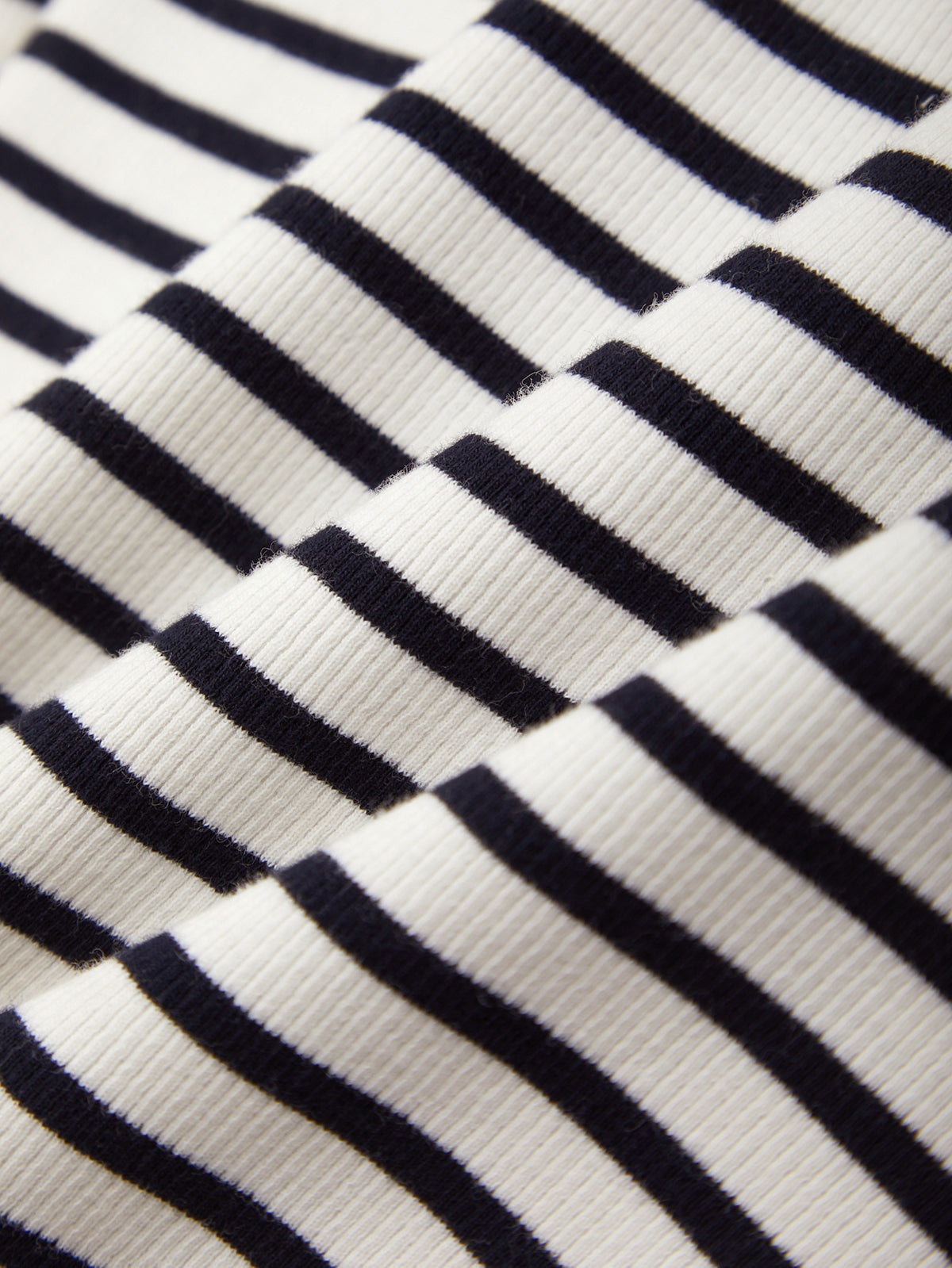 Close-up of black and white striped fabric texture