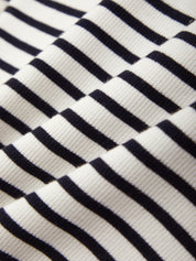 Close-up of black and white striped fabric texture