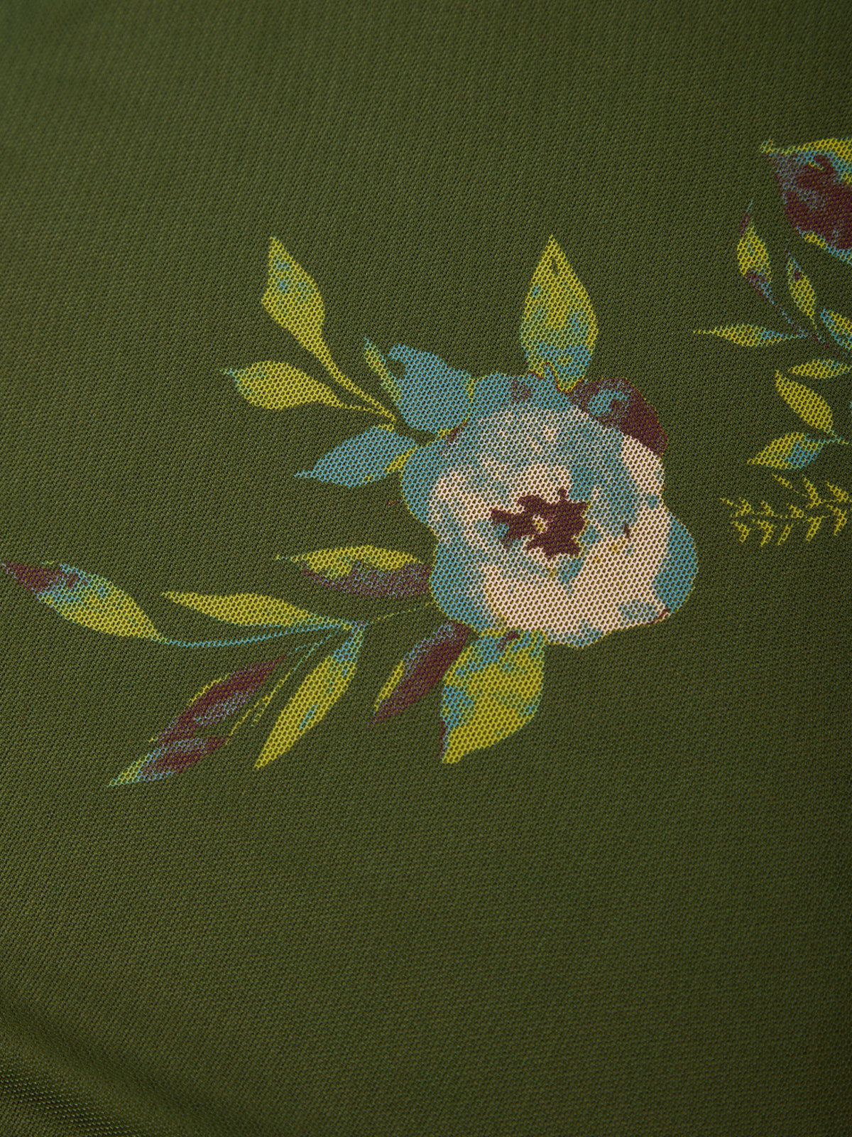 Olive green fabric with a floral print featuring a light blue and cream flower with yellow-green leaves.