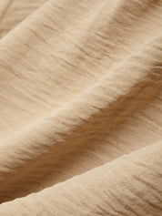 Close-up of beige fabric with visible texture