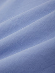 Close-up of blue fabric with visible texture