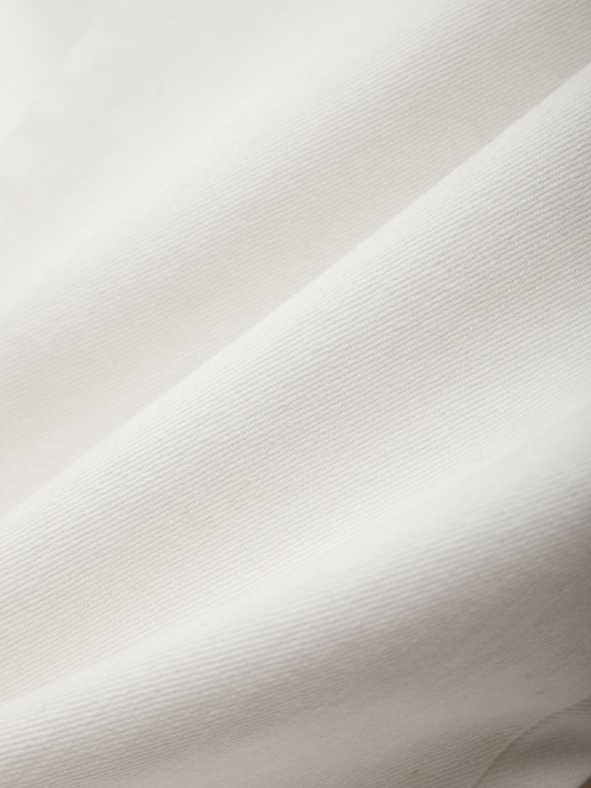 Close-up of textured white fabric