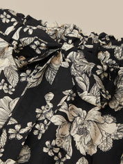 Black fabric with white floral pattern