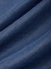 Close-up of blue fabric with a textured pattern