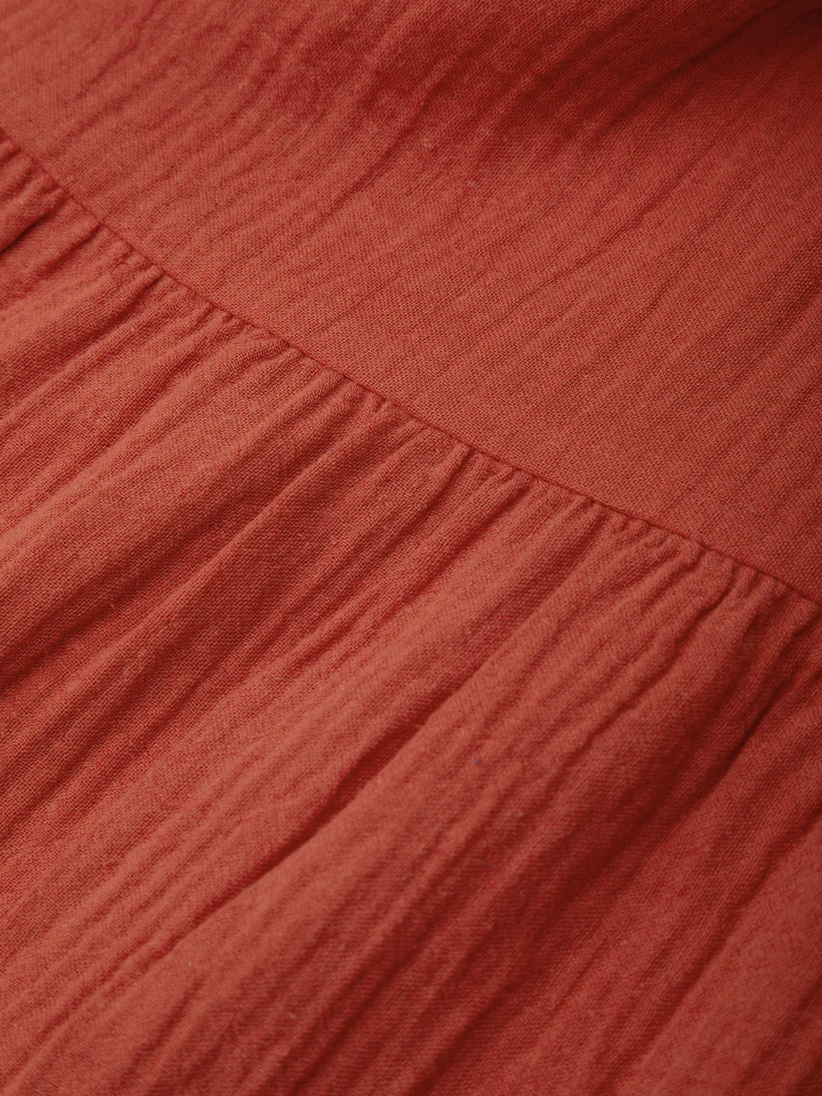 Close-up of a textured red fabric surface
