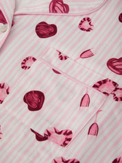 Pink fabric with heart patterns on a striped background