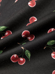 Black fabric with red cherry pattern
