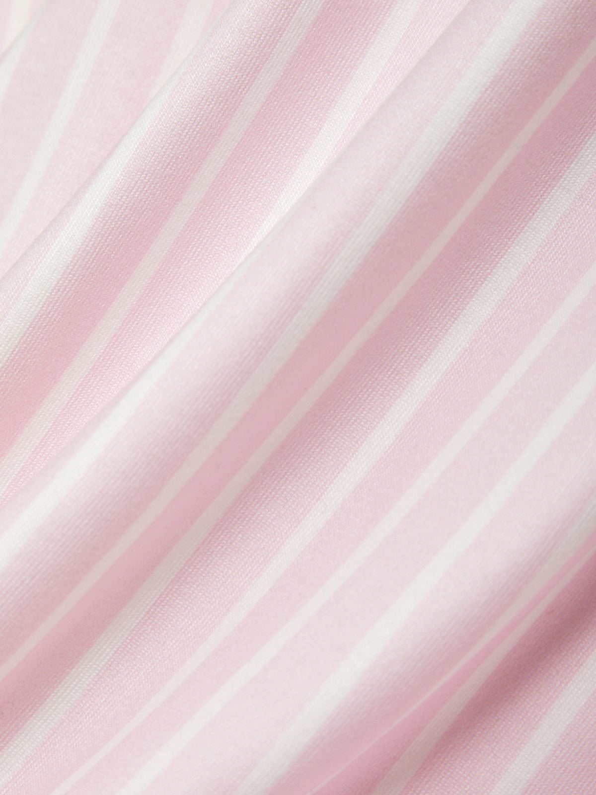 Pink fabric texture with a subtle pattern