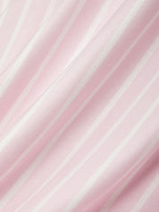 Pink fabric texture with a subtle pattern