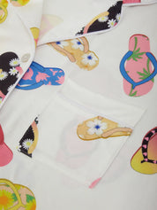 Fabric with colorful flip-flop pattern on a white background