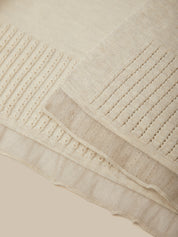 Close-up of a beige fabric with textured pattern