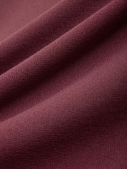 Close-up of a textured purple fabric surface