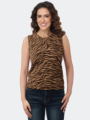 Woman wearing a brown zebra print sleeveless top on a white background