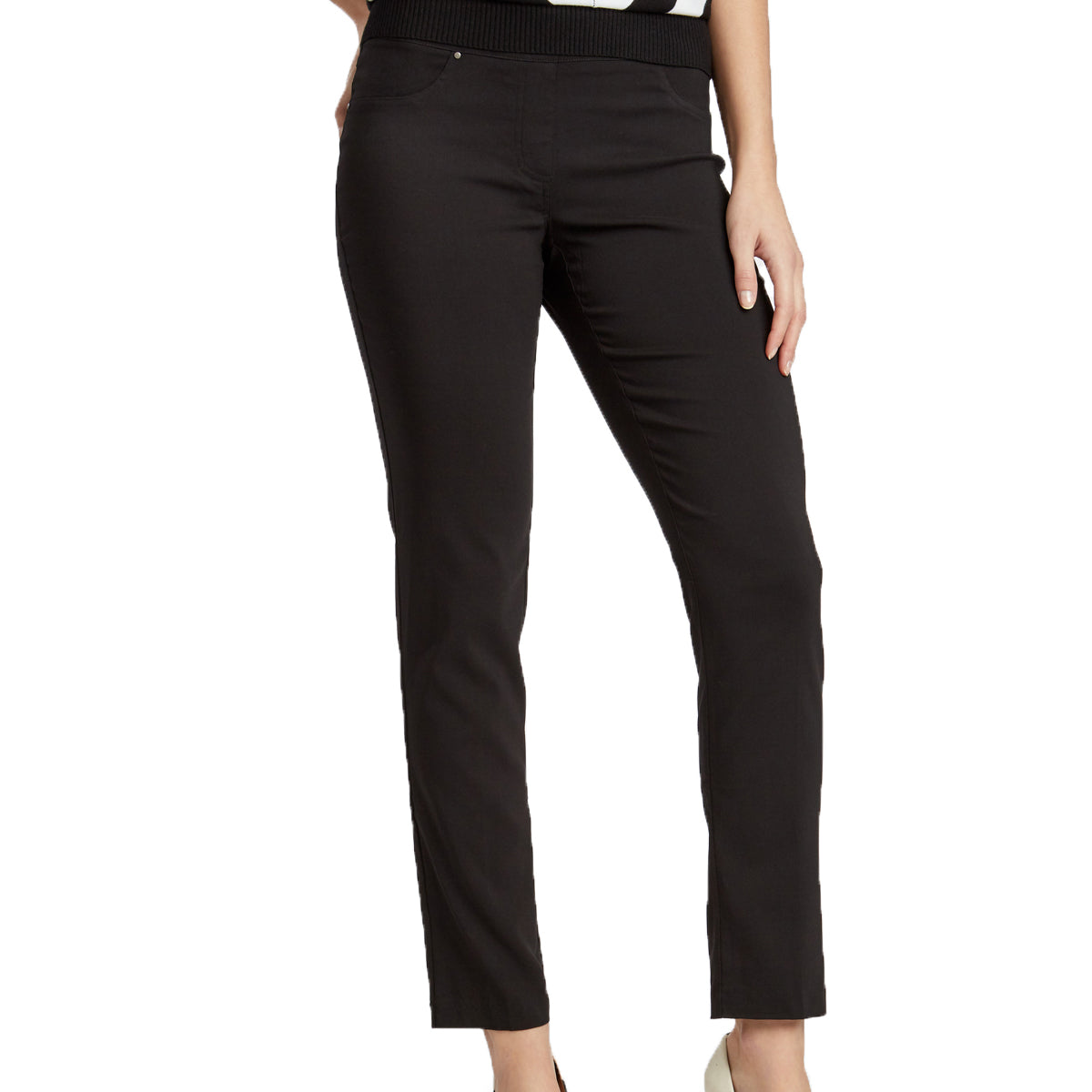 A woman standing, wearing black straight leg pants with decorative pockets at the front and dual pockets at the back, paired with a striped top.